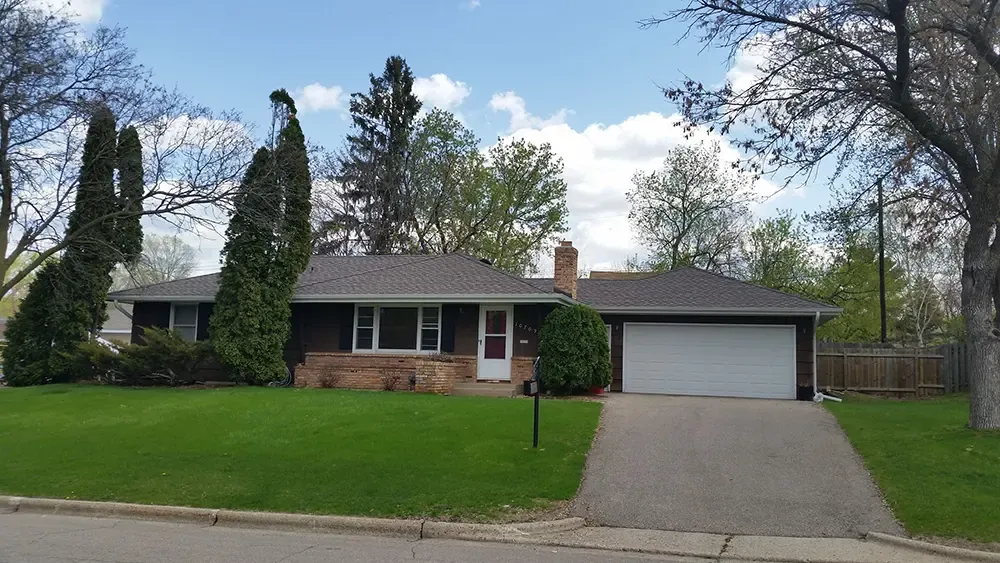 After - Full roof replacement after wind damage in Denver, CO